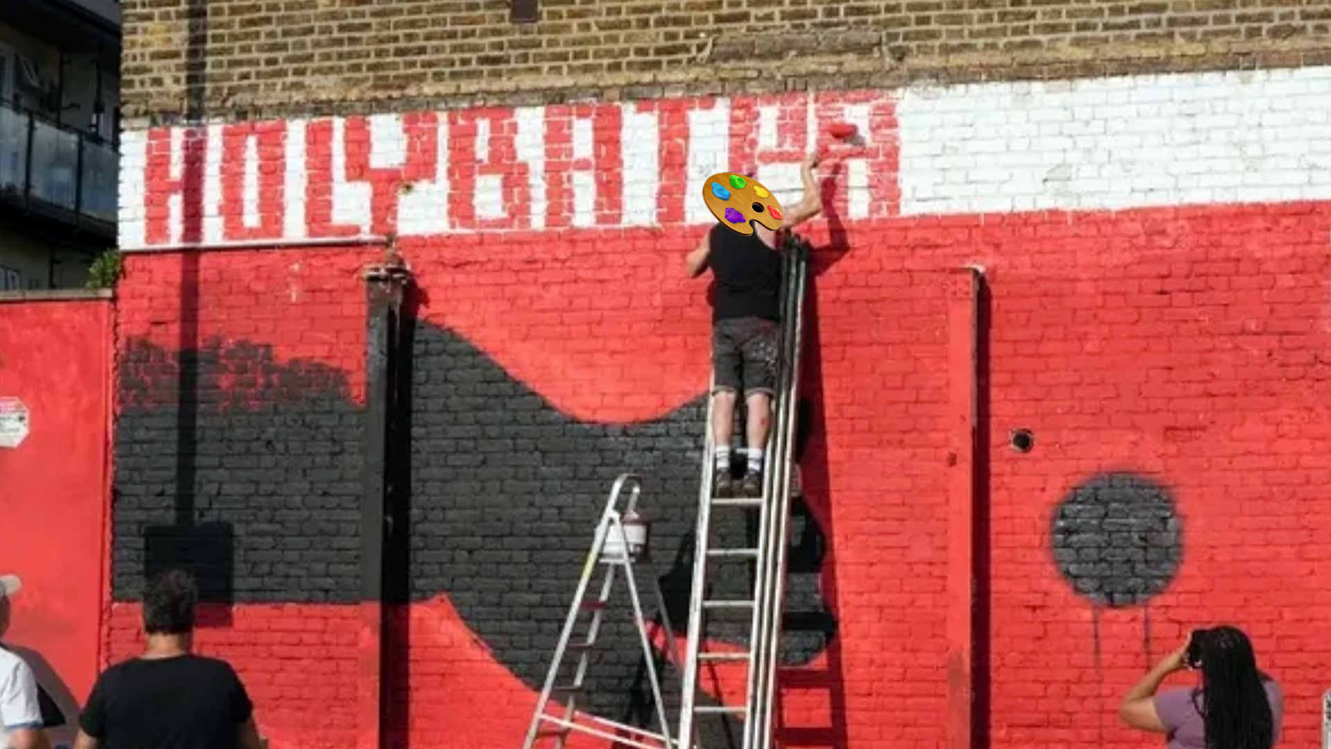 holybatpants painiting a giant cat mural in leyton midland, tilbury yard